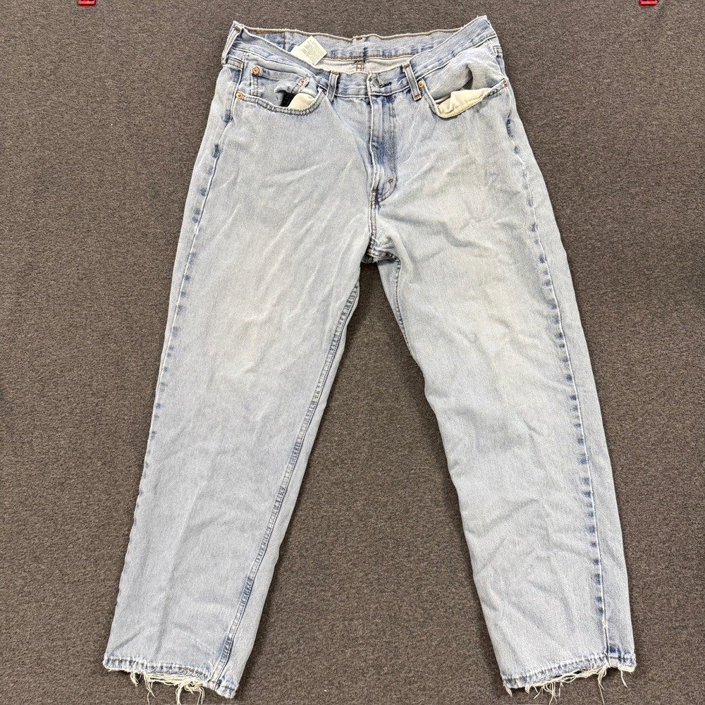 Vintage Levis 550 Relaxed Fit Jeans Mens 36x29 Light Wash Good Distressed Hem